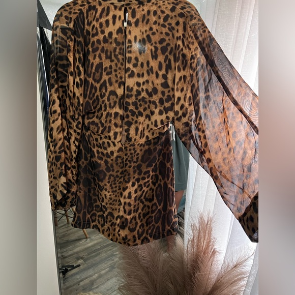 Leopard print boutique dress. Size M. It is on the shorter side. - Picture 3 of 3